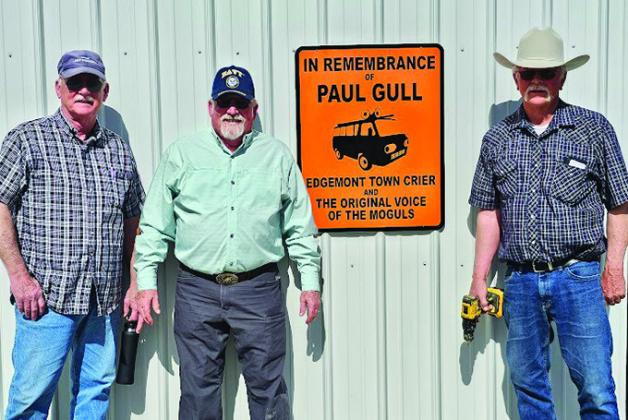 The Edgemont Alumni Association recently put up a memorial plaque on the concession stand of the Cody E. Barker Track and Field in Edgemont to commemorate the life of Edgemont graduate Paul Gull. Pictured from left to right are Mick Beard, Don Andersen, and Keith Anderson. Submitted photo