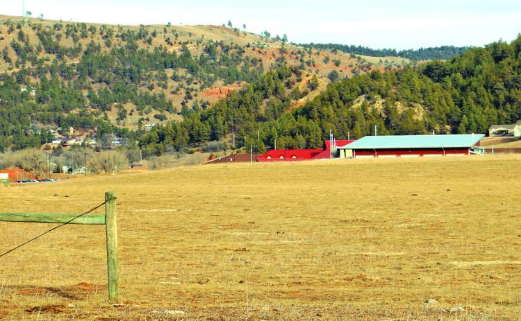This 10 acre parcel of land located west of Fall River Health Services along Hwy. 71 will soon see work beginning on a Planned Unit Development (PUD) with 51 residential lots, which will help to bring some much-needed workforce housing to the community of Hot Springs. Photo by Brett Nachtigall/Fall River County Herald-Star