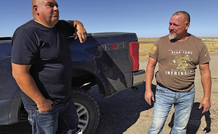 Chris Yellow Thunder, left, with David Streeter on Oct. 4, 2024, outside Streeter’s former bunker inside the Vivos xPoint residential complex. Photo by Bart Pfankuch / South Dakota News Watch)