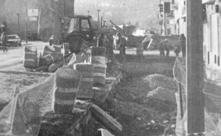 Here’s a picture from 2024…oh wait it’s from 1994 Construction crews in downtown Hot Springs were nearing the final turn in the curb, gutter, and sidewalk replacement project that had been ongoing for quite some time. Work was scheduled to progress in front of the post office and then begin down Jennings Avenue that week.