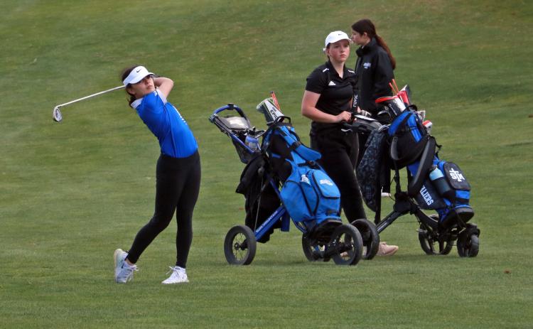 Hot Springs’ Sierra Bristow hits her approach shot towards the 18th green during the pre-region meet held at Southern Hills Golf Course earlier this month. Photo by Brett Nachtigall/Fall River County Herald-Star