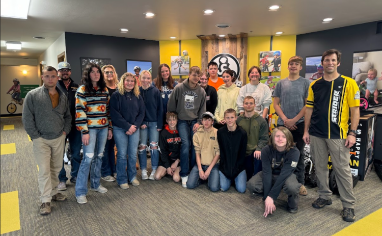 Edgemont High School students visit Strider Bike in Rapid City as part of their field trip. Shown here from left to right is Landon Heisler, Brady Joseph, Addison Neville, Garland Wright, Raelee Provorse, Allie Brunson, Hadley Hollenbeck, Sebastian Morse, Cian Waite, McKenna Alexander, Keaton Darrow, Levi Sheets, Mike Bales, Neveah Zimiga, John Heisler, Mackenzie Hollenbeck, Thomas Robertson, Ethan Lawrence, and Strider Project Design Manager Kent Jacobs. Photos by Garland Wright