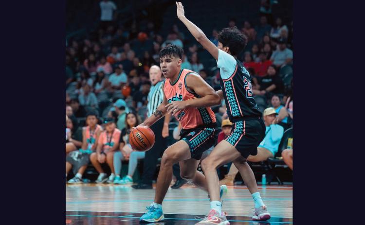 Hot Springs senior student-athlete Aidyn Janis competes last week in the Native American Basketball Invitational bracket championship game inside the Footprint Center, which is home to the Phoenix Suns and Phoenix Mercury professional basketball teams. Courtesy photo