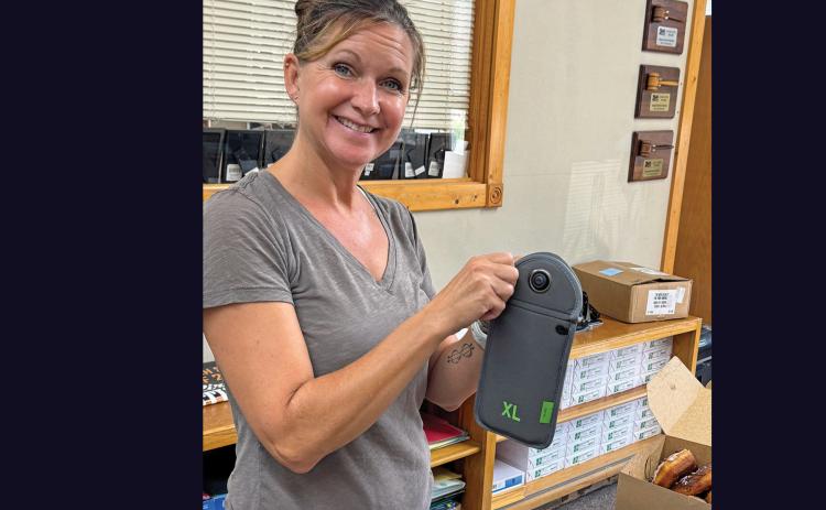 In an effort to enhance the existing no cell phone policy at Edgemont School, the District is introducing Yondr pouches. These pouches lock students’ phones up for the duration of the academic day, as demonstrated here by Becky Harding, who serves as the Student Advisor for the district.