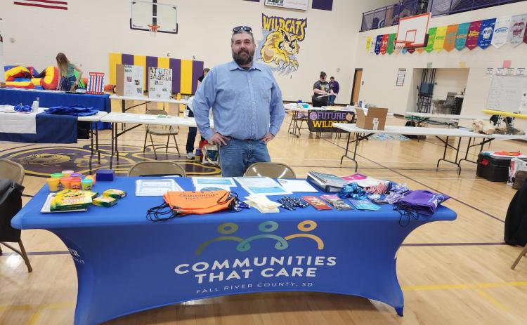 Alex Nelson with Communities That Care, pictured here at a recent event held at Custer High School, brings experience and empathy to a new youth outreach program. Courtesy photo