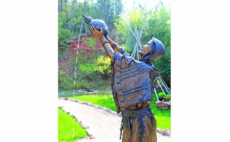 This bronze statue by local Black Hills artist Matt Lanz now welcomes guests to Moccasin Springs Natural Mineral Spa. Photo by Brett Nachtigall/Fall River County Herald-Star