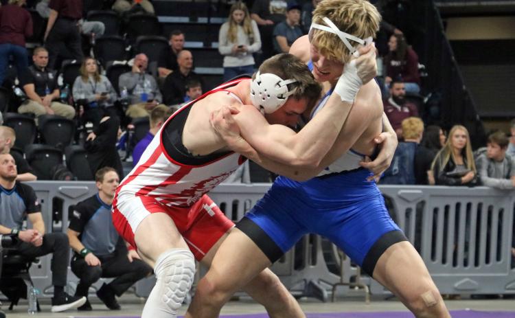 Hot Springs sophomore Hunter Kunz, right, begins to set up a throw versus Ben Suther of Britton-Hecla. Kunz would win this match with a 1:40 pin. Photo by Brett Nachtigall/Fall River County Herald-Star