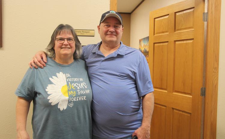 The sign remains the same: Mayor Rheta Reagan, and her husband Troy, outside of the Mayor’s office after learning of her re-election on Tuesday, April 8. Photo by Linda Baird/FRC Herald Star