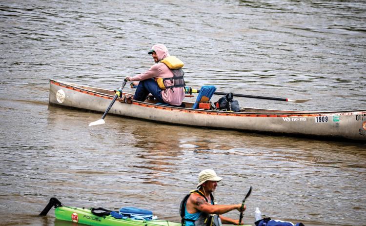 Jonathan Wiley of Hot Springs looks over his shoulder as he rows his 18-foot canoe during the Missouri River 340mile race held earlier this month. Submitted photo