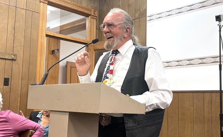 Don Ackerman presents his idea for an ICE detention center to be located in or near Hot Springs during last week’s county commission meeting. Photo by Beth Bogart