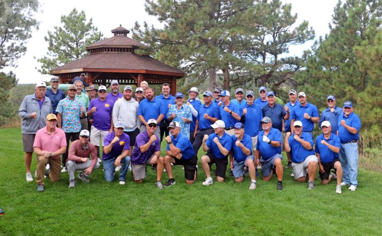 Members of the Hot Springs Southern Black Hills Cup Team (on right in Bison blue) squared off against a team of Custer golfers (on left) in a new, hopefully annual event this past weekend at Southern Hills Golf Course. Photo by Brett Nachtigall/Fall River County Herald-Star