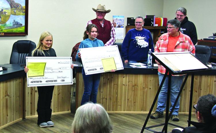 Braxton Hanes (left) and Olivia Renwick share the city’s Citizen of the Year award. Impressive was their Summer efforts to help clean the park and pond showing a keen sense of community awareness. Photo by Lance Borde/Fall River County Herald-Star