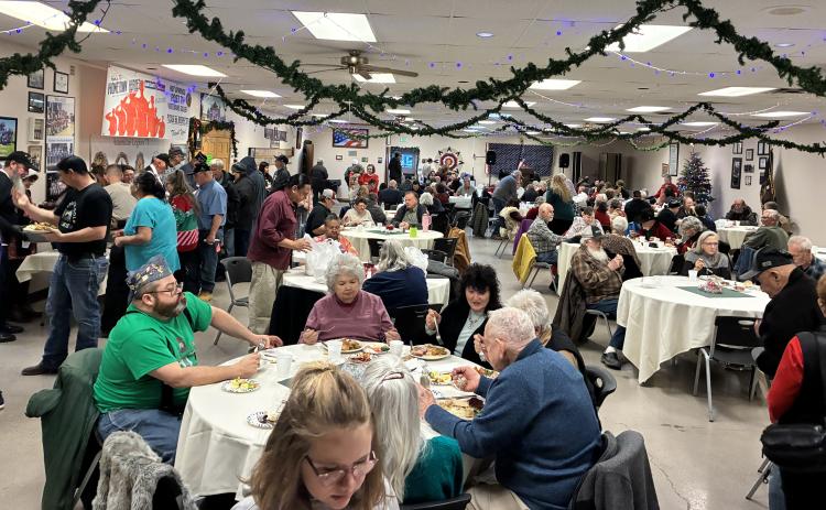 Full tables and full bellies at the annual Community Christmas Dinner hosted by the American Legion Family and the Hot Springs Elks Lodge.