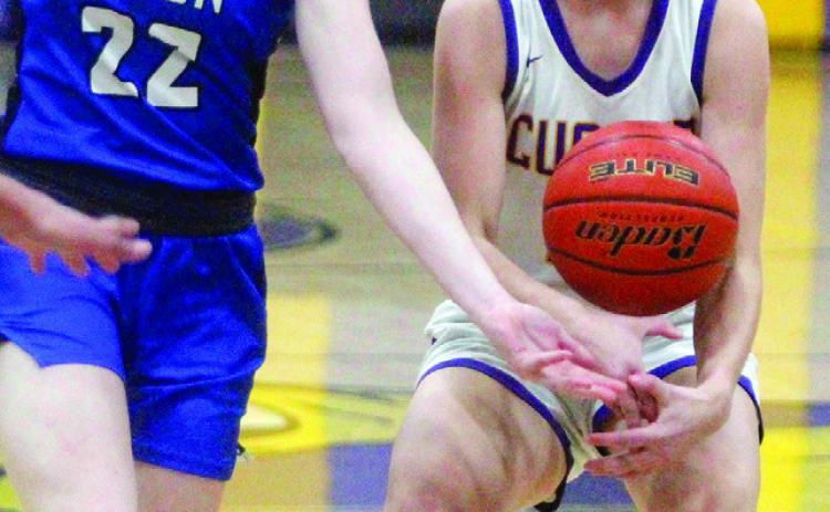 Hot Springs sophomore Ashlynn Elshere attempts to force a turnover last Thursday night in Custer. Photo by Jason Ferguson/CCC