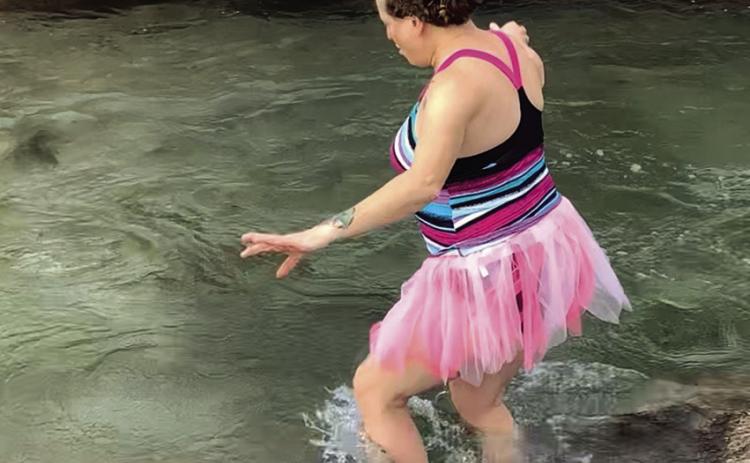Dressed in a tutu, Tracy Day of Hot Springs prepares to jump into the waters of Cascade Falls during her annual New Years Polar Plunge, which she started doing while living in Seattle. Since moving to Hot Springs three years ago, Day has enticed some friends to now join her and hopes to see the event expanded in the future. Courtesy photo