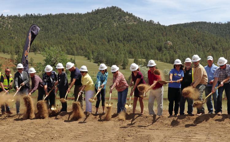 Fall River Health Services staff and board of board of directors, as well as the Community Health and Development, Inc., City of Hot Springs, Southern Hills Economic Development and Scull Construction of Rapid City take part in a ground breaking on Monday, June 15, for the new Cascade Hills Subdivision. Photo by Brett Nachtigall/Fall River County Herald-Star