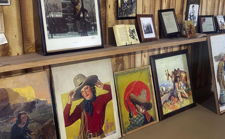 Eight new oil paintings by native son Charles Hargens, who gained national fame as a western-themed illustrator, augments the section devoted to him at the Pioneer Museum’s top-floor gallery, a seasonal loan from the Dakota Discovery Museum. Photo by Beth Bogart/Fall River County Herald-Star