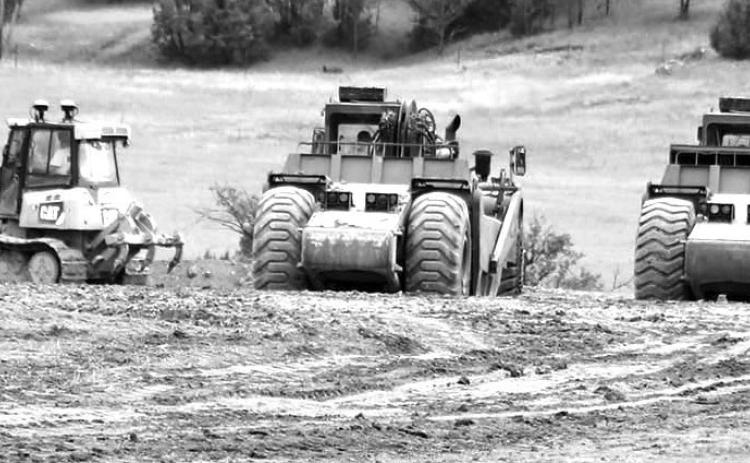 Heavy equipment recently began moving dirt at the future site of the Cascade Hills Subdivision. Photo by Brett Nachtigall/Fall River County Herald-Star