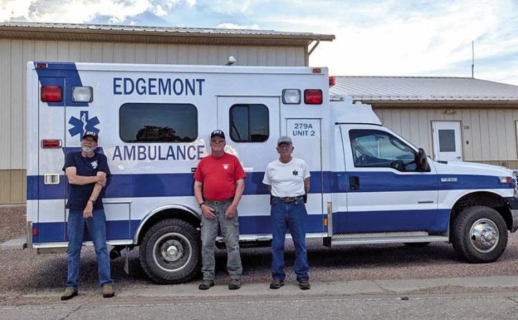 Edgemont Ambulance Services’ two EMTs include, from left, Bill Kreutzer and Paul Nelsen, along with George Darrow, who has been the driver for more than 25 years. Not pictured is substitute EMT Dee Hughes from Hot Springs and Jordan Stevens of Edgemont, who is a new mother of a brand-new baby girl. Courtesy photo