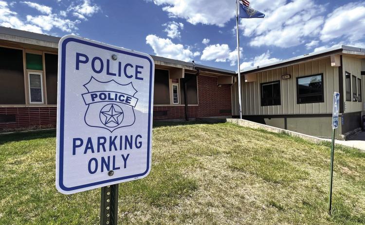 A sign located near the entrance to the Hot Springs Elementary School reserves a parking spot for the district’s School Resource Officer or any other law enforcement officers who respond to calls at the school. Photo by Brett Nachtigall/Fall River County Herald-Star