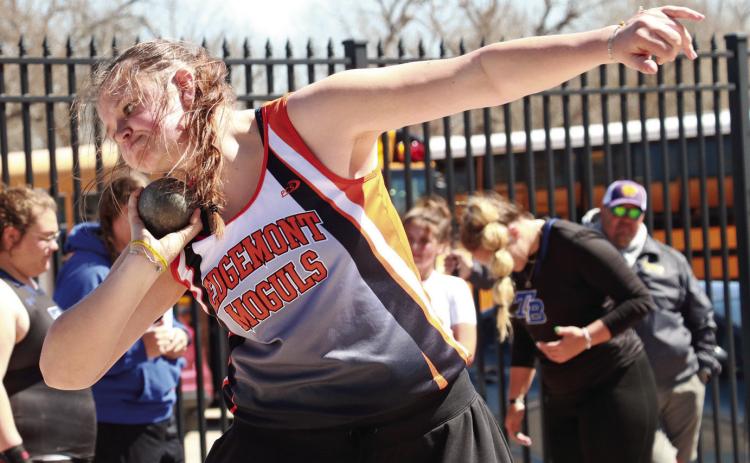 Edgemont junior Hadley Hollenbeck gets set to launch the shot put during last week’s Track-O-Rama. She is currently ranked sixth in the state’s Class “B” standings after throwing a PR last week and placing sixth overall at the meet. Photo by Brett Nachtigall/Fall River County Herald-Star