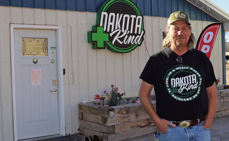 Dakota Kind owner Forrest Fanning stands in front of his medicinal cannabis dispensary this past Monday, Jan. 27. Last Tuesday, Jan. 21, Fanning joined several others at the Hot Springs City Council meeting where they shared their support of a previously proposed cannabis ordinance change that was voted down 6 to 2 at the Jan. 6 council meeting. Photo by Brett Nachtigall/Fall River County Herald-Star