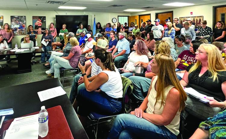 Photo by Brett Nachtigall/Fall River County Herald-Star A packed house was on hand for a special meeting of the Hot Springs School Board last Thursday, July 31, where it was decided to add five days to the end of school year, rather than have five weeks of five full days of classroom instruction during the 2025-26 calendar.