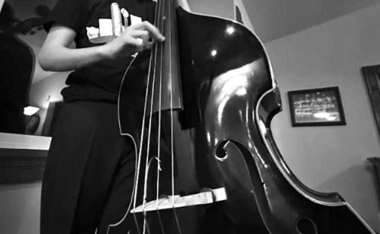 Landon Harrod will perform in the upcoming Middle School All-State Orchestra on February 26 at 3 pm. Harrod will be playing the bass as the Second Chair. Photo courtesy of Darrell Harrod