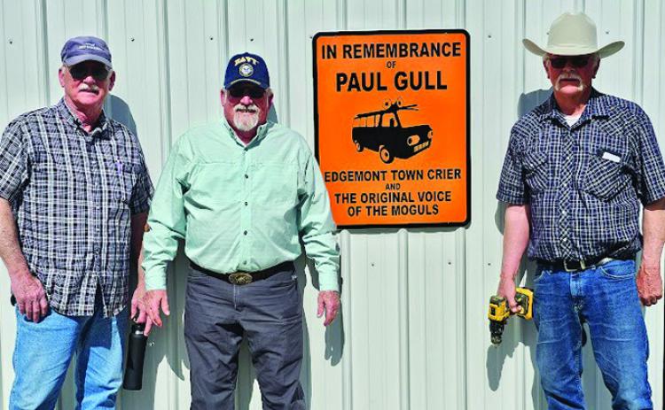 The Edgemont Alumni Association recently put up a memorial plaque on the concession stand of the Cody E. Barker Track and Field in Edgemont to commemorate the life of Edgemont graduate Paul Gull. Pictured from left to right are Mick Beard, Don Andersen, and Keith Anderson. Submitted photo